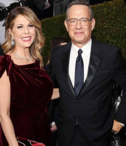 Larry Hanks brother Tom Hanks with his wife Rita Wilson in an event.